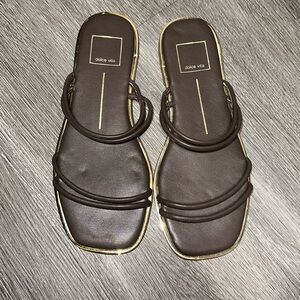 Brown sandals with gold detailing